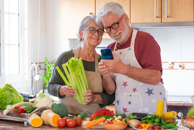 Man and woman preparing food