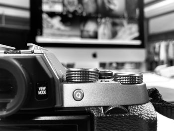 Close-up of camera on table