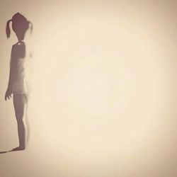 Close-up of tree over black background