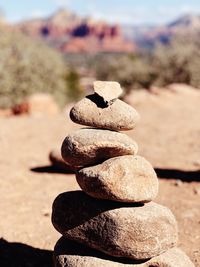 Close-up of stone stack on rock