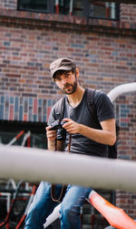 Man riding bicycle on the wall