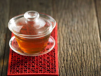 High angle view of tea in glass cup on table