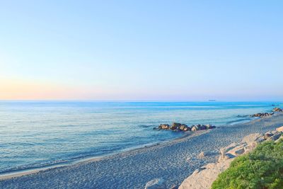 Scenic view of sea against clear sky