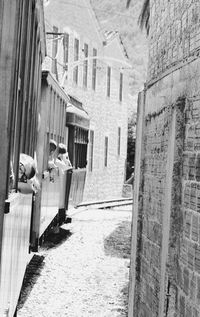 Alley amidst buildings in city