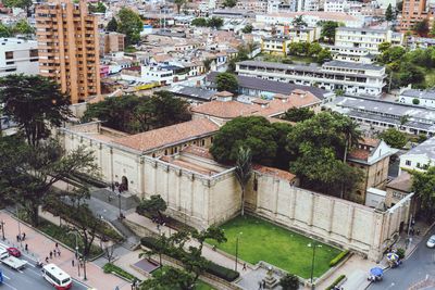 High angle view of street amidst buildings in city