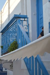 Low angle view of man on steps in balcony