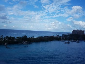 View of calm sea against cloudy sky