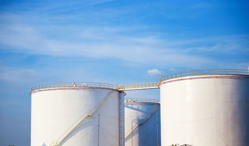 Low angle view of factory against sky