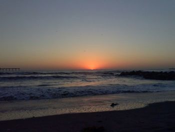 Scenic view of sea at sunset