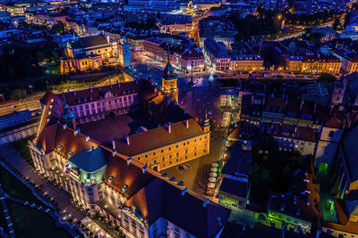 High angle view of illuminated buildings in city