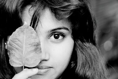 Close-up portrait of young woman