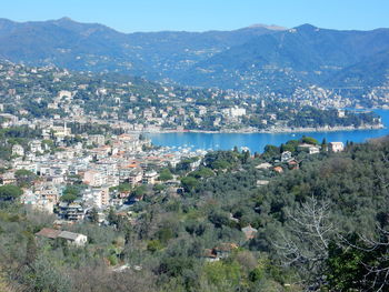 High angle view of townscape and mountains