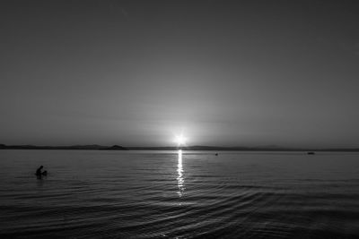 Scenic view of sea at sunset