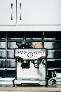 Close-up of machine on table at home