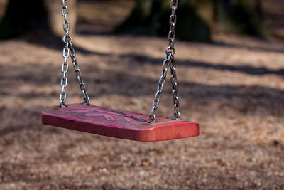 Close-up of swing in playground