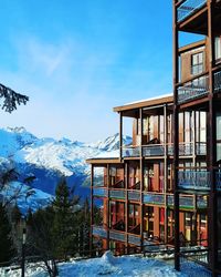 View of building on snowcapped mountain