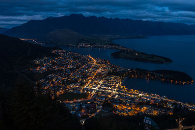 High angle view of illuminated townscape at night