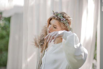 Beautiful woman with white flowers