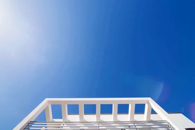 Low angle view of building against clear blue sky