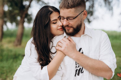 Young couple kissing outdoors