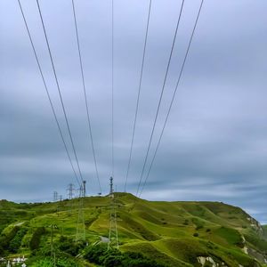 Electricity pylon against sky