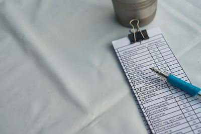 High angle view of pen on table