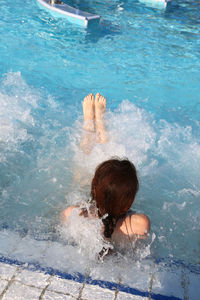 High angle view of woman in swimming pool