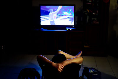 Close-up of woman in dark