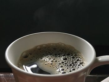 High angle view of coffee cup on table