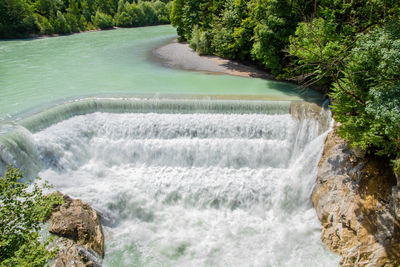 High angle view of waterfall in forest