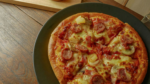 High angle view of pizza on table