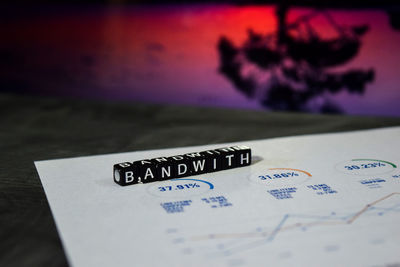 Close-up of text on paper on table