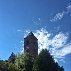 Low angle view of built structure against blue sky