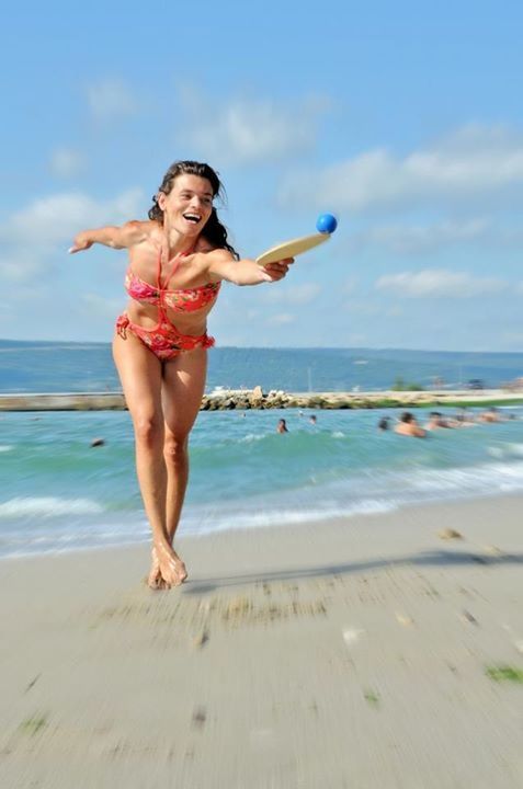 beach, sea, person, water, lifestyles, leisure activity, shore, young adult, sand, full length, horizon over water, sky, happiness, vacations, young women, enjoyment, casual clothing, fun