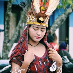 Portrait of young woman wearing mask