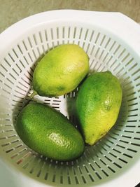High angle view of fruit in plate on table