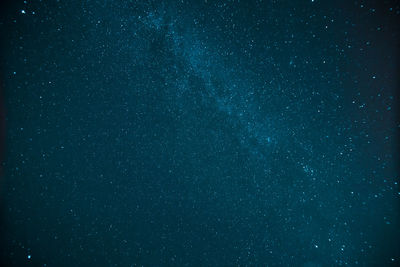 Sky filled with stars and milky way from a low angle