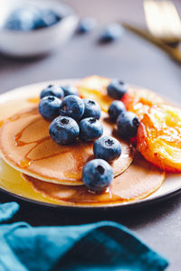 Close-up of breakfast served on table