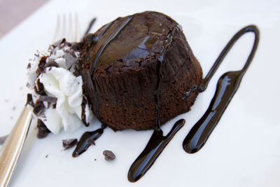 Close-up of ice cream and fork in plate