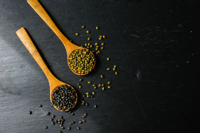 High angle view of bread on table against black background