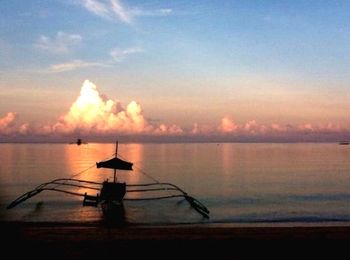 Scenic view of sunset over sea