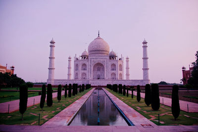 Taj mahal tomb reflected in still waters