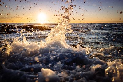 Scenic view of sea at sunset