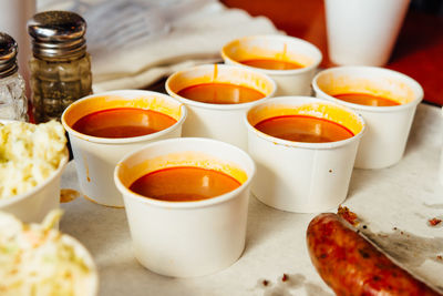 Close-up of soup bowls on table