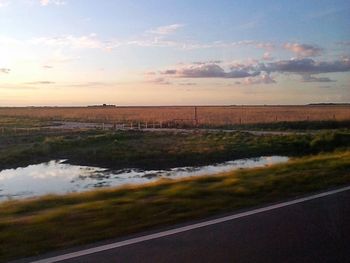 Scenic view of landscape at sunset