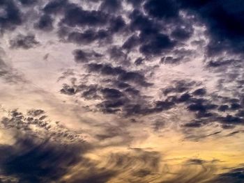 Low angle view of dramatic sky during sunset