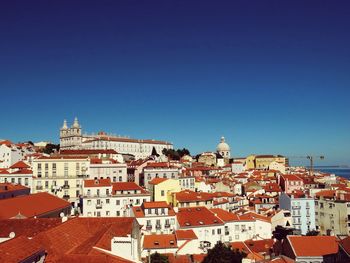 Sao jorge castle in town against clear blue sky