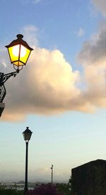 Low angle view of street light against sky