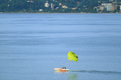 People floating on sea