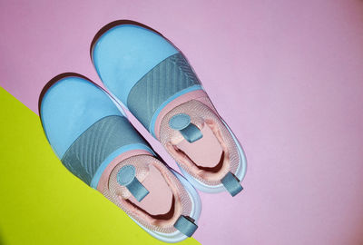 High angle view of multi colored shoes on table